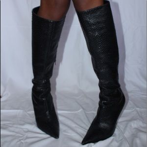 Genuine leather skinned boots.